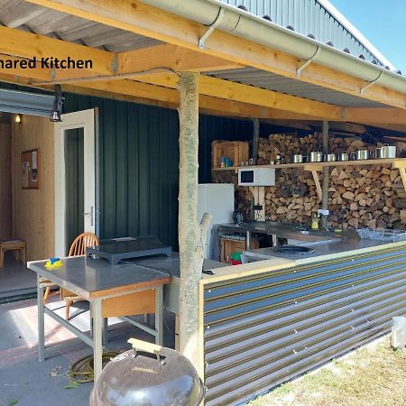 ホテル Kampeerplaats Glamping Essenhof アーフテーケルケ エクステリア 写真